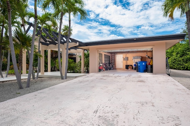 garage featuring driveway