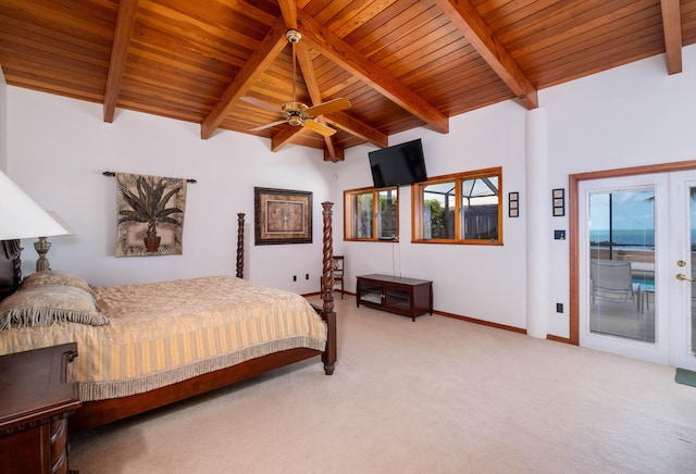 bedroom with carpet floors, access to exterior, beamed ceiling, and baseboards