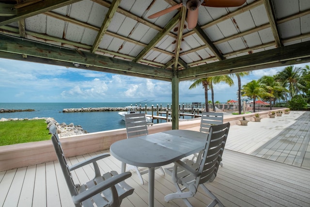 wooden deck featuring a gazebo and a water view
