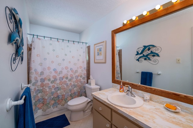 full bathroom featuring curtained shower, toilet, a textured ceiling, vanity, and tile patterned flooring