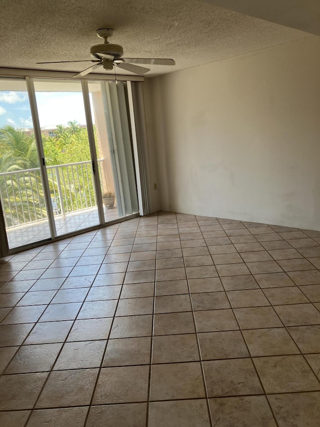 3930 S Roosevelt Blvd Unit N303, Key West, FL 33040 - tiled spare room with a textured ceiling and ceiling fan