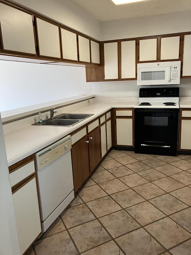 3930 S Roosevelt Blvd Unit N303, Key West, FL 33040 - kitchen with white appliances and light countertops