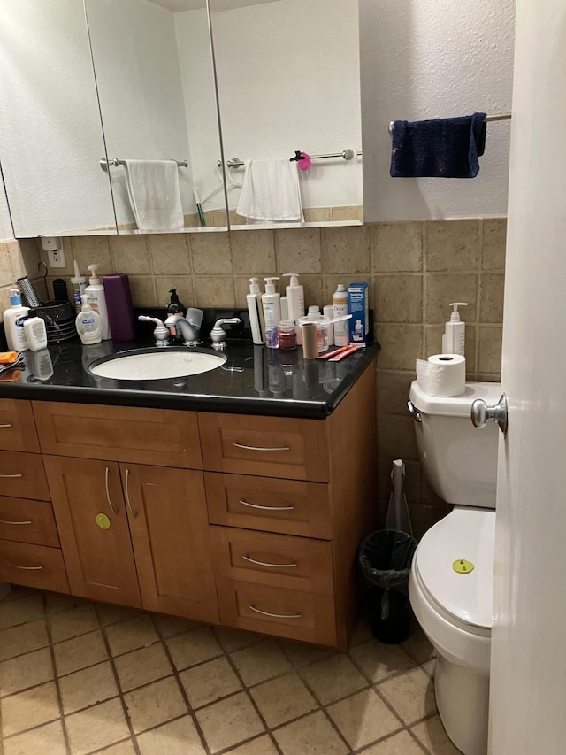 3930 S Roosevelt Blvd Unit N303, Key West, FL 33040 - bathroom featuring vanity, tile patterned flooring, and tile walls