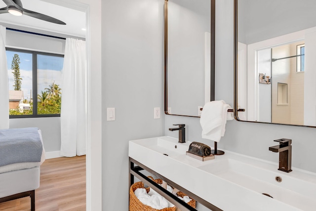 949 24th St, Ocean, Marathon, FL 33050 - bathroom featuring double vanity, wood finished floors, and ceiling fan