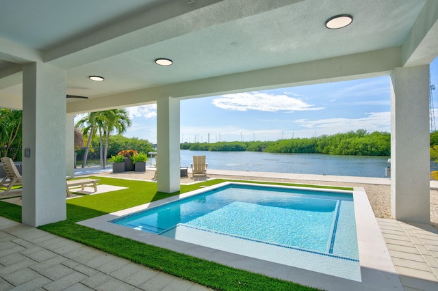 949 24th St, Ocean, Marathon, FL 33050 - outdoor pool featuring a water view, a patio, and a lawn