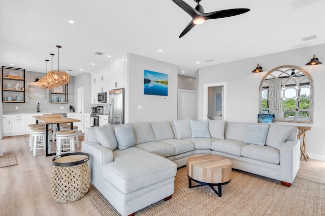 949 24th St, Ocean, Marathon, FL 33050 - living room with light wood-type flooring, a ceiling fan, and recessed lighting