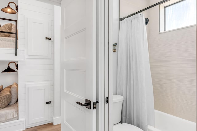 949 24th St, Ocean, Marathon, FL 33050 - bathroom featuring shower / bath combination with curtain and wood finished floors