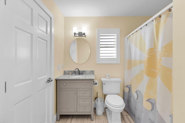 150 10th St, Key Colony, FL 33051 - bathroom featuring vanity, toilet, a shower with shower curtain, and wood finished floors