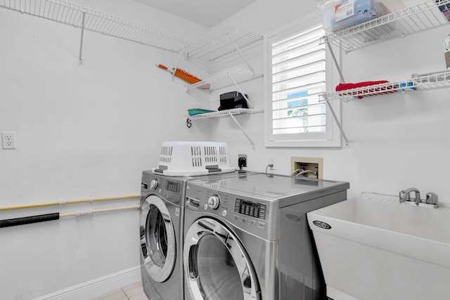 150 10th St, Key Colony, FL 33051 - laundry area featuring washer and clothes dryer and baseboards