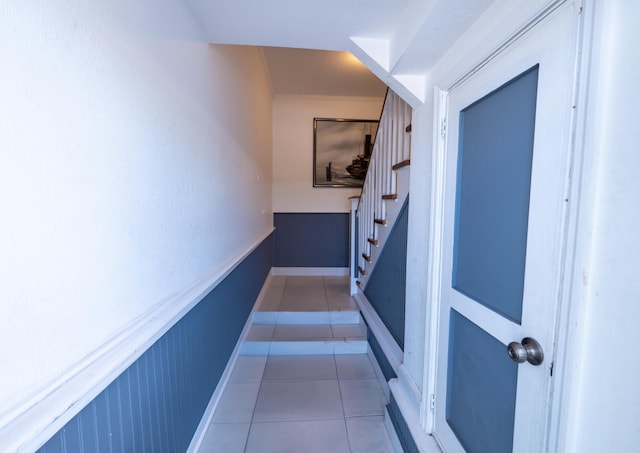 1124 Catherine St Unit 202, Key West, FL 33040 - staircase featuring tile patterned flooring, crown molding, and baseboards