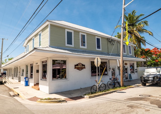 1124 Catherine St Unit 202, Key West, FL 33040 - view of front of property with covered porch and metal roof
