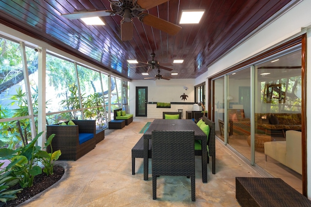 1110 Johnson St, Key West, FL 33040 - sunroom with ceiling fan, outdoor dining area, and plenty of natural light