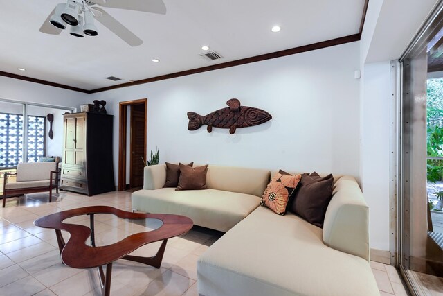 1110 Johnson St, Key West, FL 33040 - living room with ornamental molding, ceiling fan, recessed lighting, and light tile patterned floors