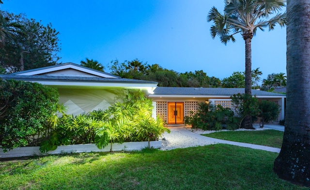 1110 Johnson St, Key West, FL 33040 - ranch-style home with a front lawn