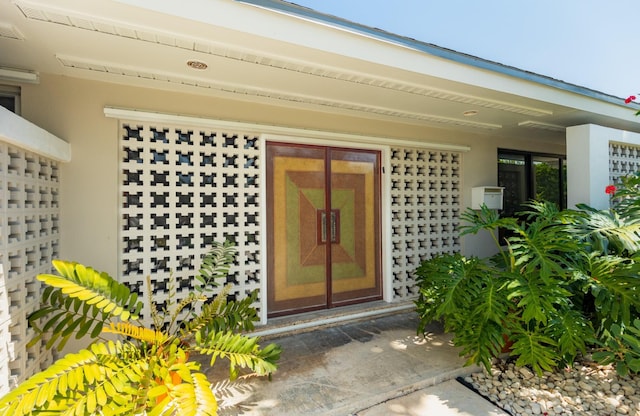 1110 Johnson St, Key West, FL 33040 - doorway to property featuring stucco siding