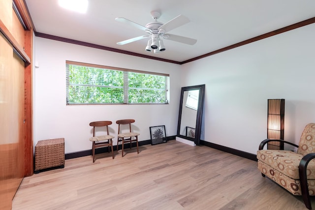 1110 Johnson St, Key West, FL 33040 - sitting room featuring light wood-style floors, ornamental molding, baseboards, and ceiling fan