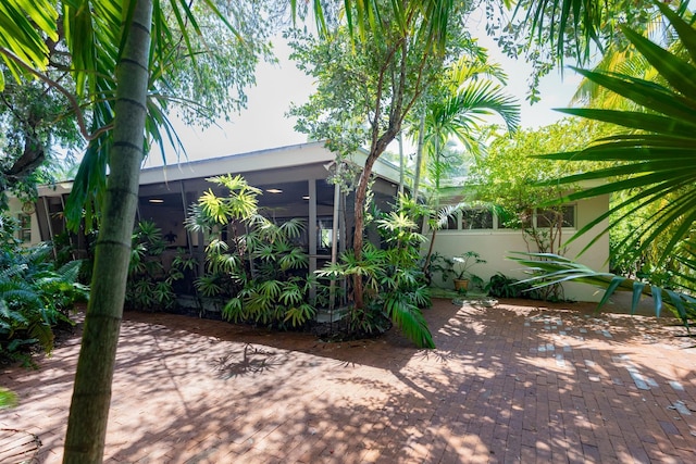 1110 Johnson St, Key West, FL 33040 - back of property featuring a sunroom and a patio area