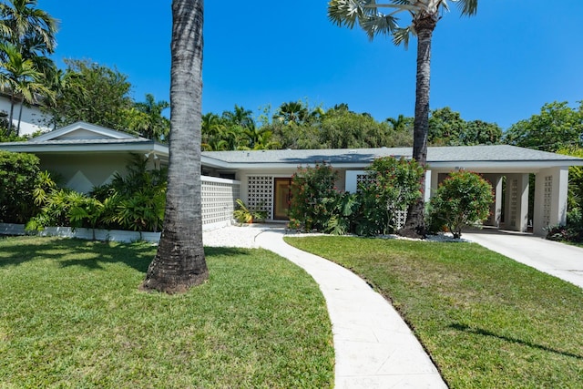 1110 Johnson St, Key West, FL 33040 - view of front of house featuring a front lawn and concrete driveway