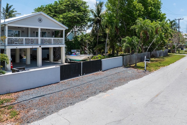 45 1st St, Big Coppitt, FL 33040 - exterior space with a ceiling fan and a fenced front yard
