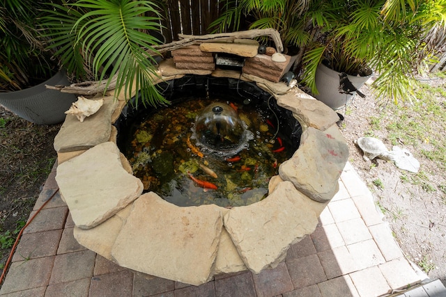 45 1st St, Big Coppitt, FL 33040 - exterior details with a small pond