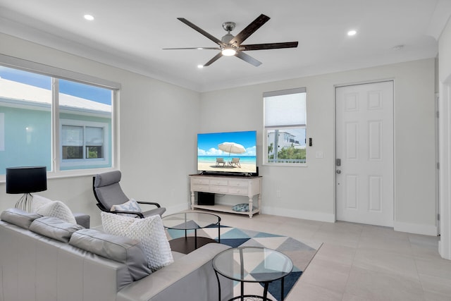 living room featuring light tile patterned floors and ceiling fan