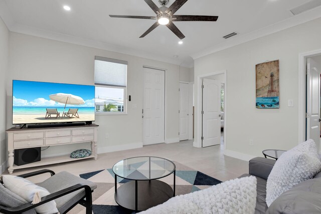 living room featuring crown molding and ceiling fan