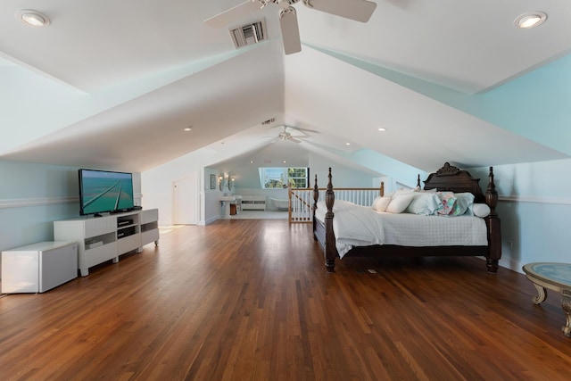 bedroom with vaulted ceiling, ceiling fan, wood finished floors, and visible vents