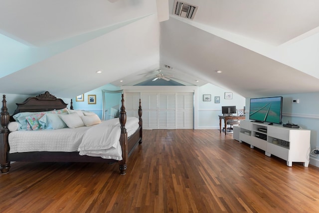 bedroom with a ceiling fan, lofted ceiling, visible vents, and wood finished floors