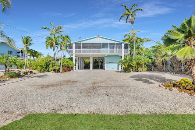 1514 Shaw Dr, Key Largo, FL 33037 - beach home with a sunroom, a carport, and driveway