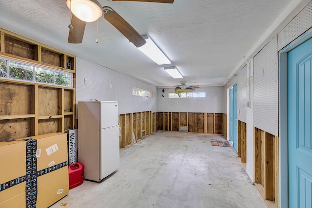 1514 Shaw Dr, Key Largo, FL 33037 - basement with freestanding refrigerator and ceiling fan