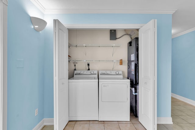 1514 Shaw Dr, Key Largo, FL 33037 - laundry area with washing machine and clothes dryer, crown molding, and light tile patterned floors