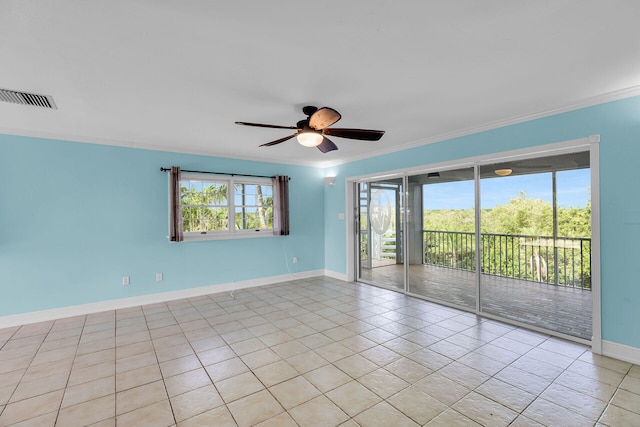 1514 Shaw Dr, Key Largo, FL 33037 - empty room featuring ornamental molding, a ceiling fan, and light tile patterned flooring