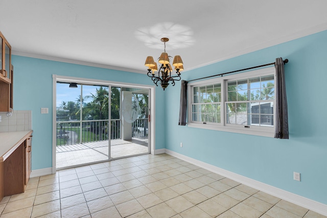 1514 Shaw Dr, Key Largo, FL 33037 - unfurnished dining area featuring a chandelier, light tile patterned flooring, and crown molding