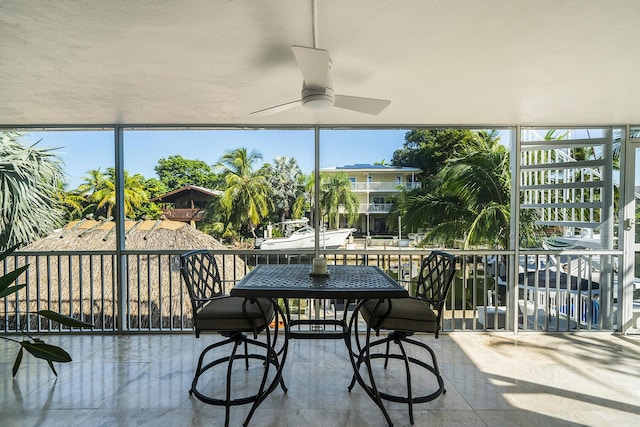 balcony featuring ceiling fan