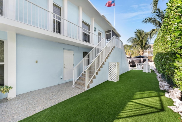 view of yard with stairway