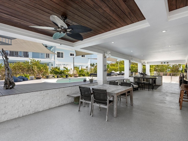 view of patio / terrace featuring outdoor dining space and ceiling fan