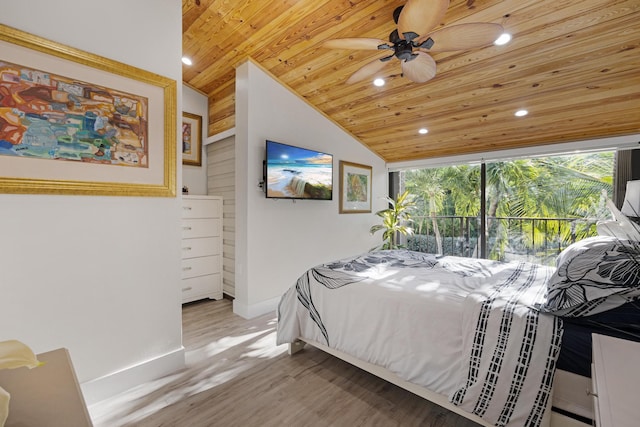 bedroom with lofted ceiling, wood ceiling, and light wood-type flooring