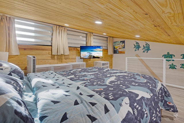 bedroom with hardwood / wood-style flooring, wood walls, and wooden ceiling