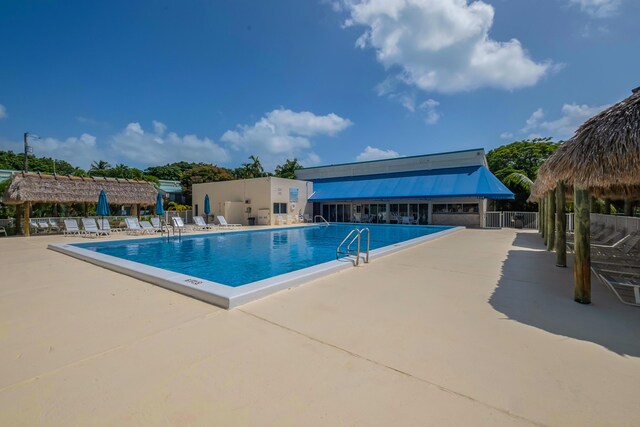 view of pool featuring a patio and a gazebo