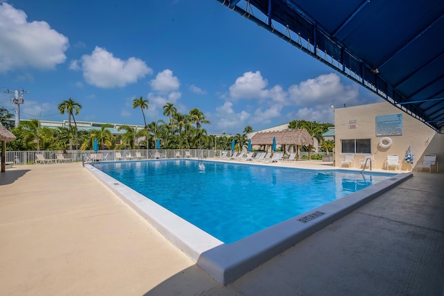 view of swimming pool featuring a patio area