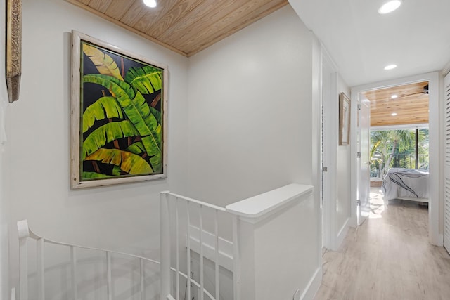 hallway featuring wood ceiling and light wood-type flooring