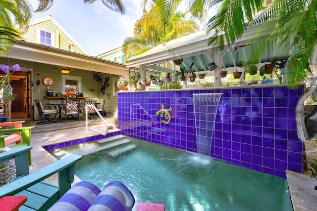 view of swimming pool featuring a patio area