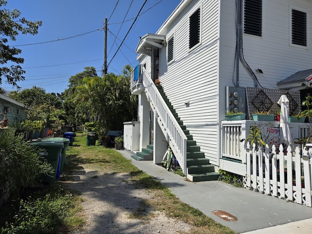 view of home's exterior with stairs