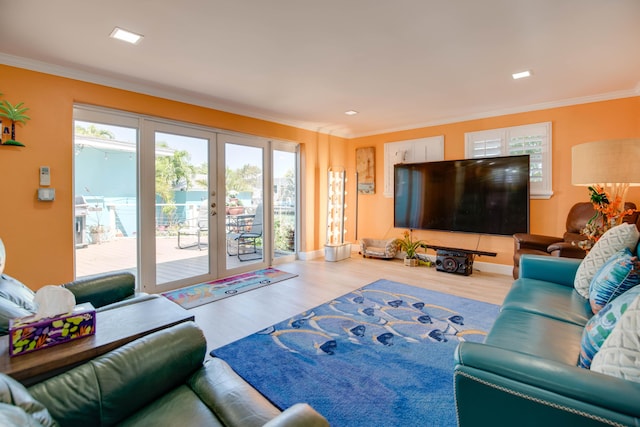 24 Cactus Dr, Big Coppitt, FL 33040 - living room featuring french doors, wood finished floors, baseboards, and ornamental molding