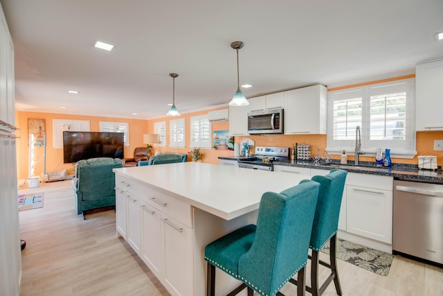 24 Cactus Dr, Big Coppitt, FL 33040 - kitchen with plenty of natural light, appliances with stainless steel finishes, white cabinetry, and a sink