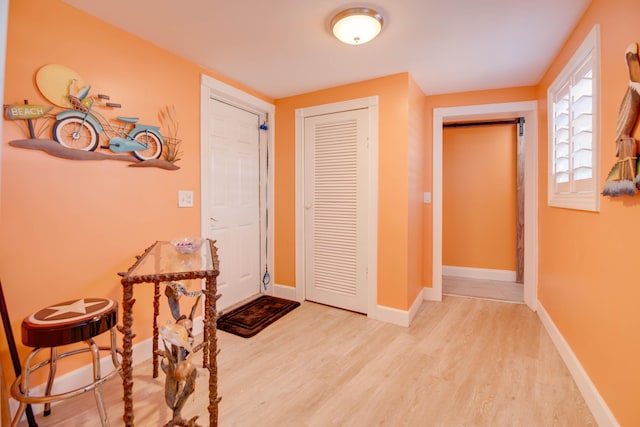 24 Cactus Dr, Big Coppitt, FL 33040 - foyer entrance with baseboards and wood finished floors