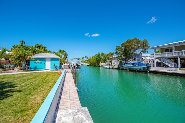 24 Cactus Dr, Big Coppitt, FL 33040 - dock area with a yard and a water view