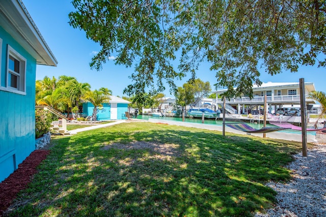24 Cactus Dr, Big Coppitt, FL 33040 - view of yard with a dock