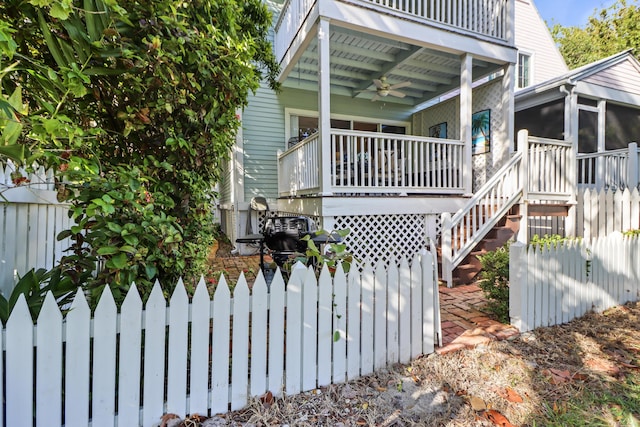 11 Kestral Way, Key West, FL 33040 - view of home's exterior featuring ceiling fan, a porch, and a sunroom