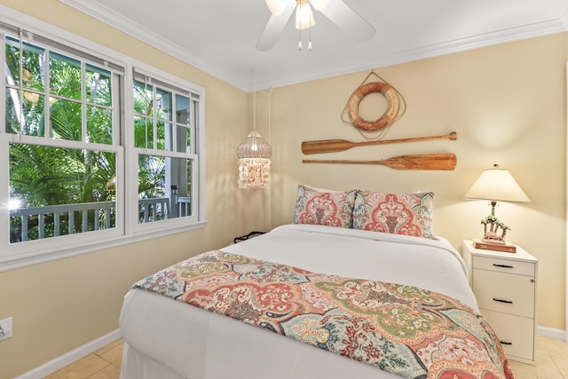 11 Kestral Way, Key West, FL 33040 - tiled bedroom featuring multiple windows, ornamental molding, and ceiling fan